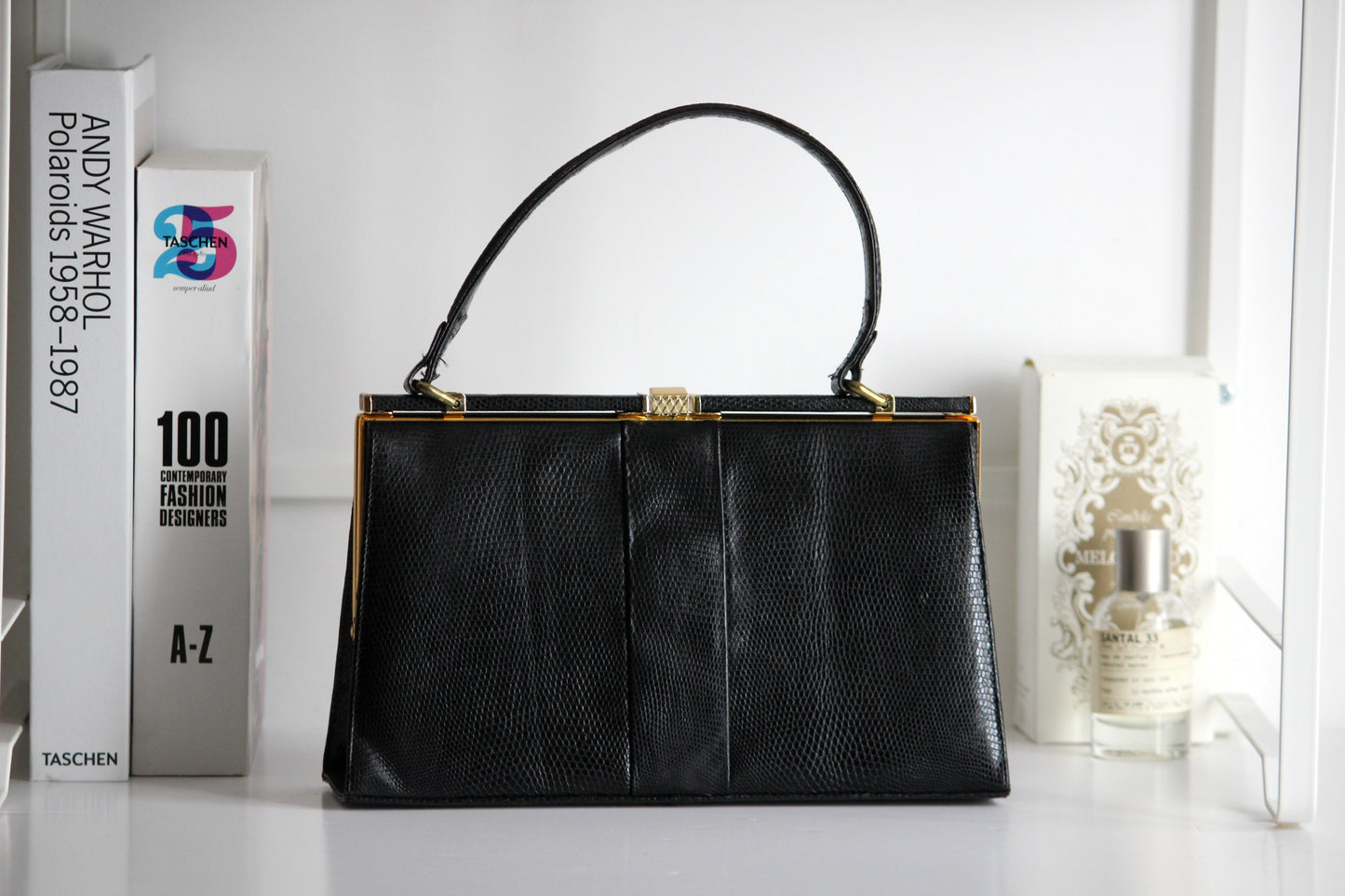 Eleanor – early ’60s black lizard-embossed leather frame bag by Jane Shilton