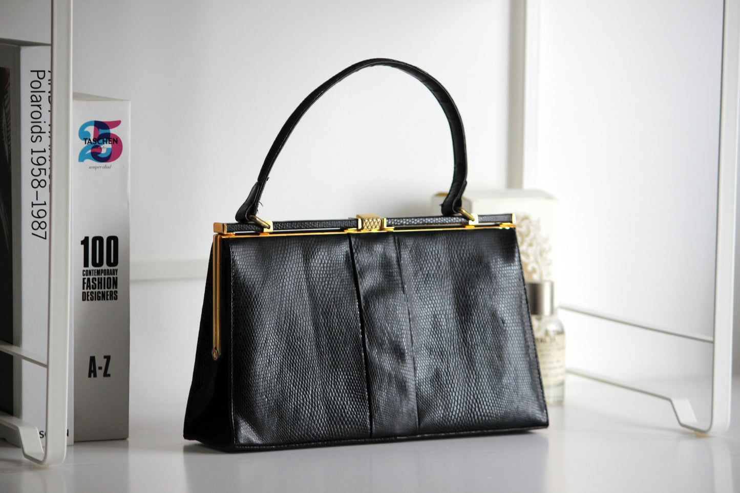 Eleanor – early ’60s black lizard-embossed leather frame bag by Jane Shilton