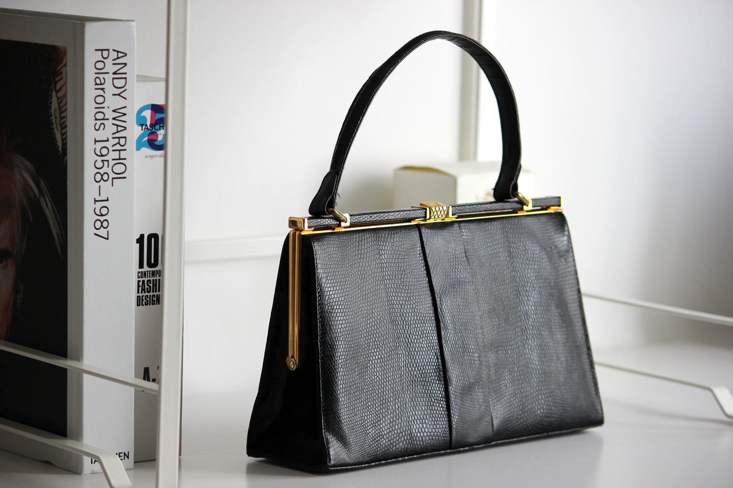 Eleanor – early ’60s black lizard-embossed leather frame bag by Jane Shilton