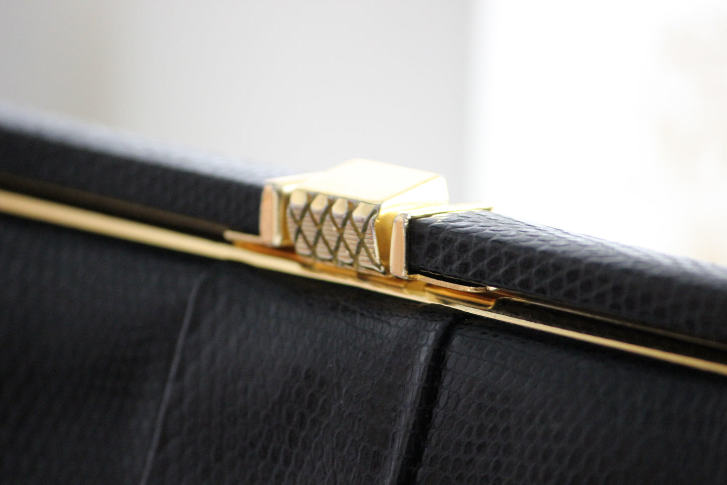 Eleanor – early ’60s black lizard-embossed leather frame bag by Jane Shilton