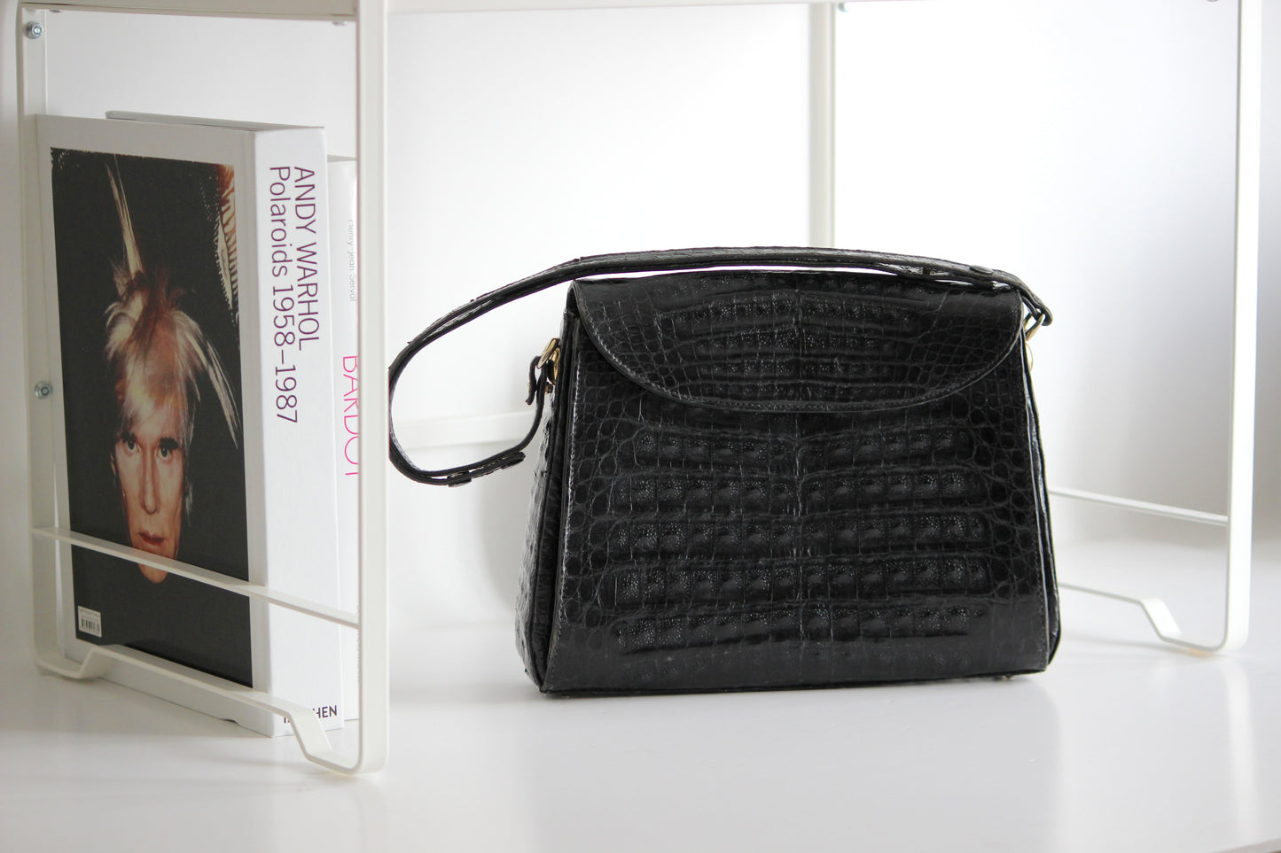 Clio – early ’80s black crocodile-embossed leather shoulder bag