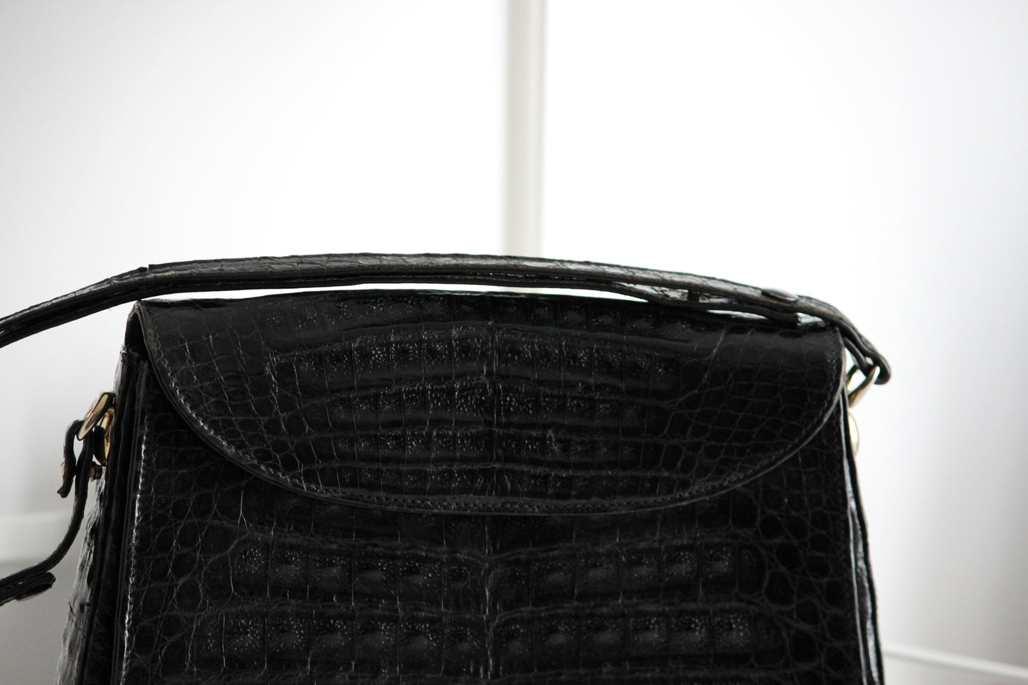 Clio – early ’80s black crocodile-embossed leather shoulder bag