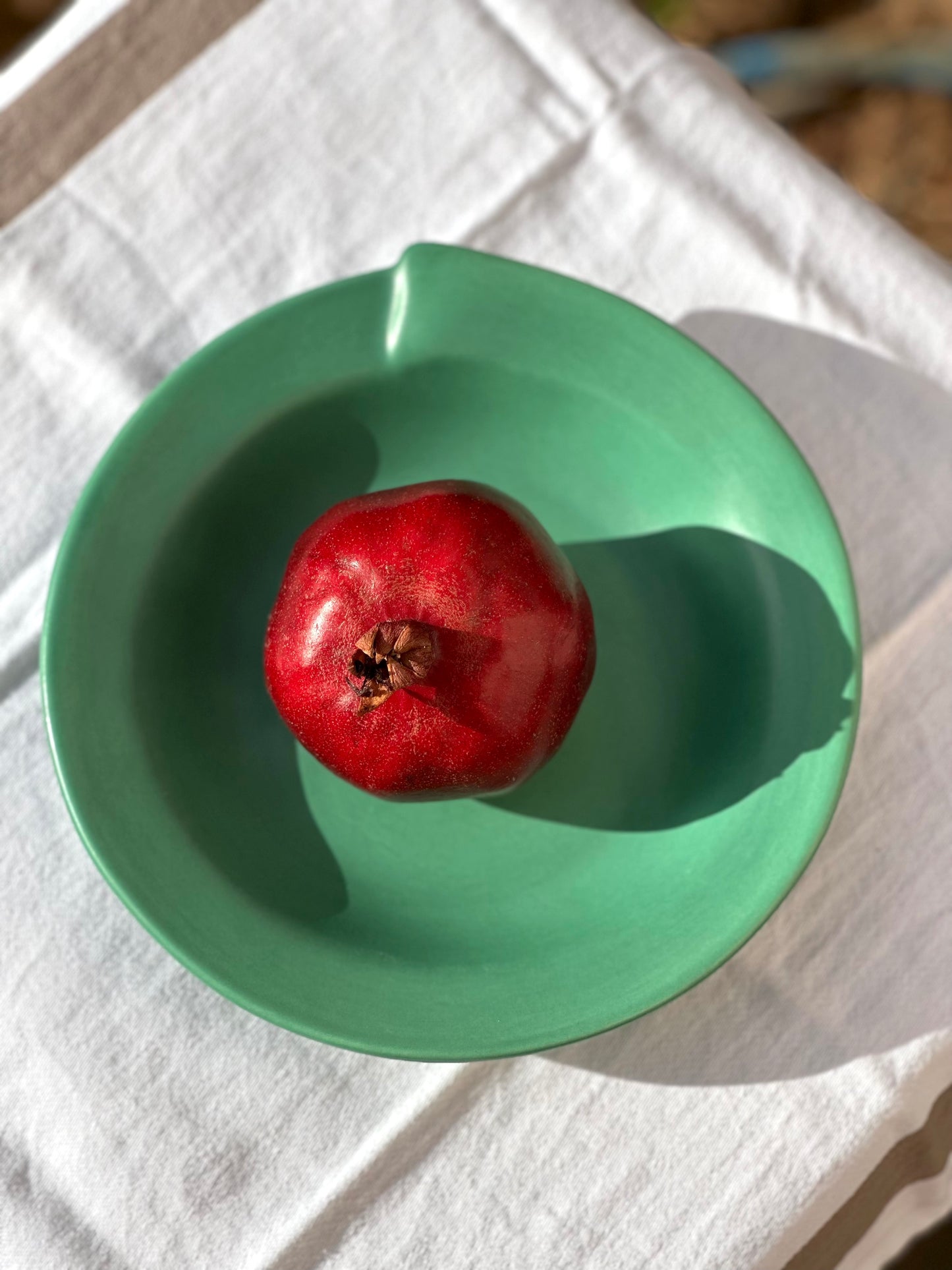 Julie Sanders “Cyclamen” dinnerware set – matte green ceramic, 20-piece, 1990s