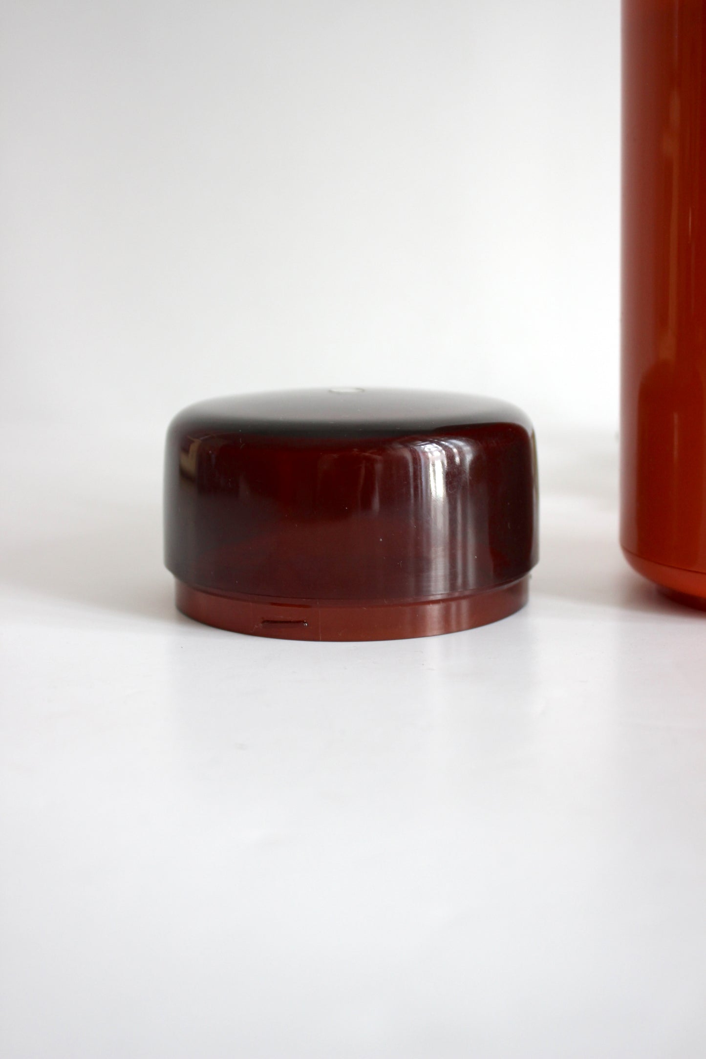 Vintage Rowenta electric coffee grinder · orange + smoked plastic · Germany, 1970s