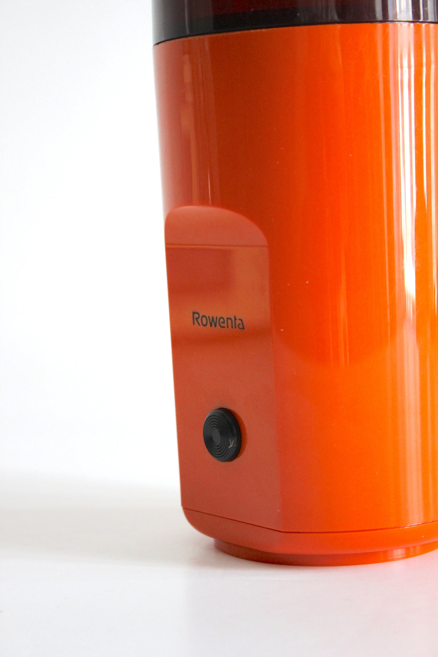 Vintage Rowenta electric coffee grinder · orange + smoked plastic · Germany, 1970s