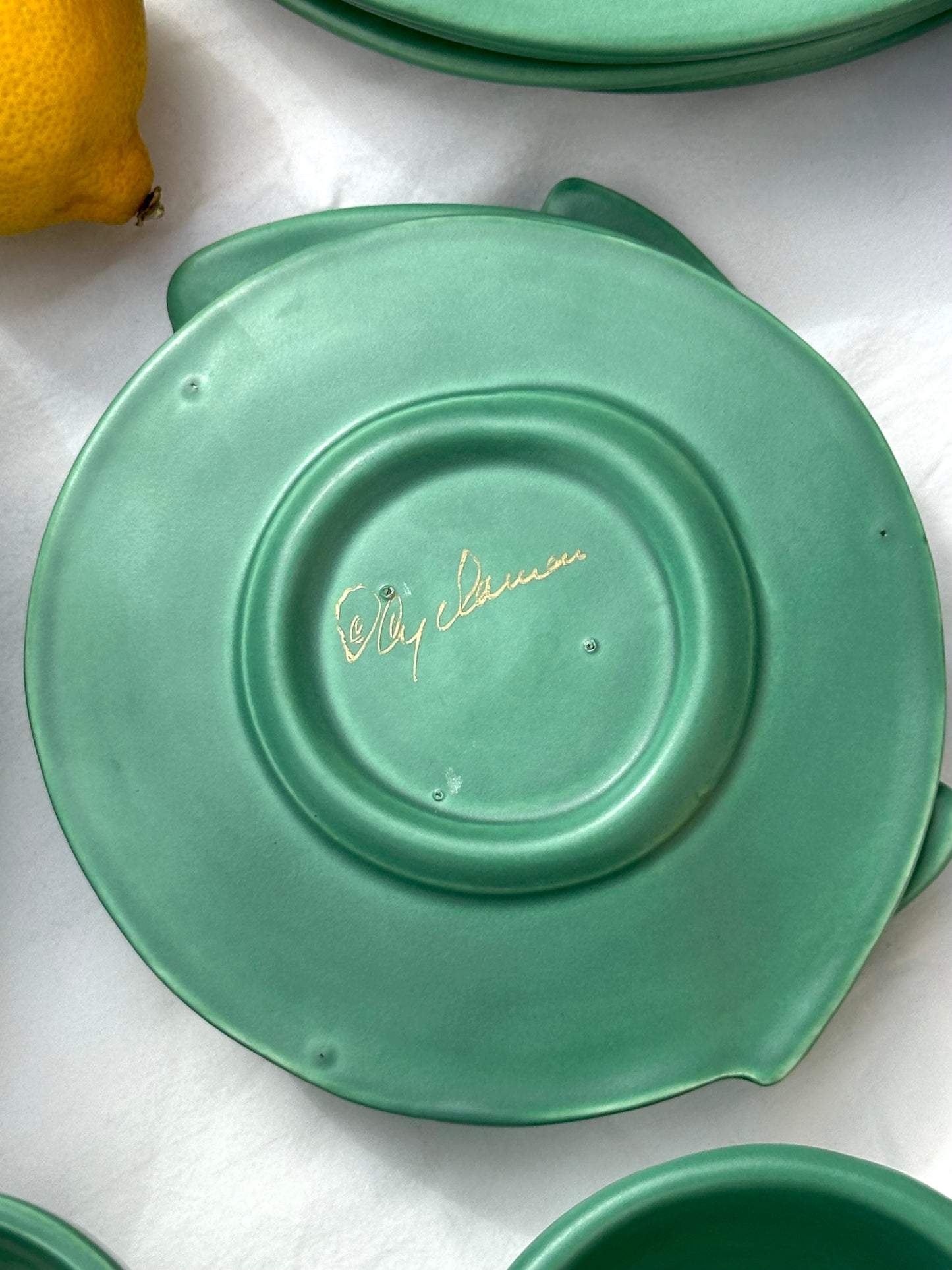 Julie Sanders “Cyclamen” dinnerware set – matte green ceramic, 20-piece, 1990s