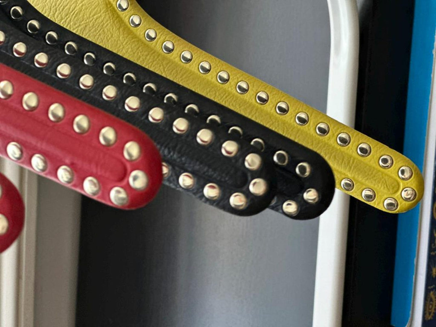 Set of 7 vintage skai hangers with studs. Mid-century. Germany, 1960s