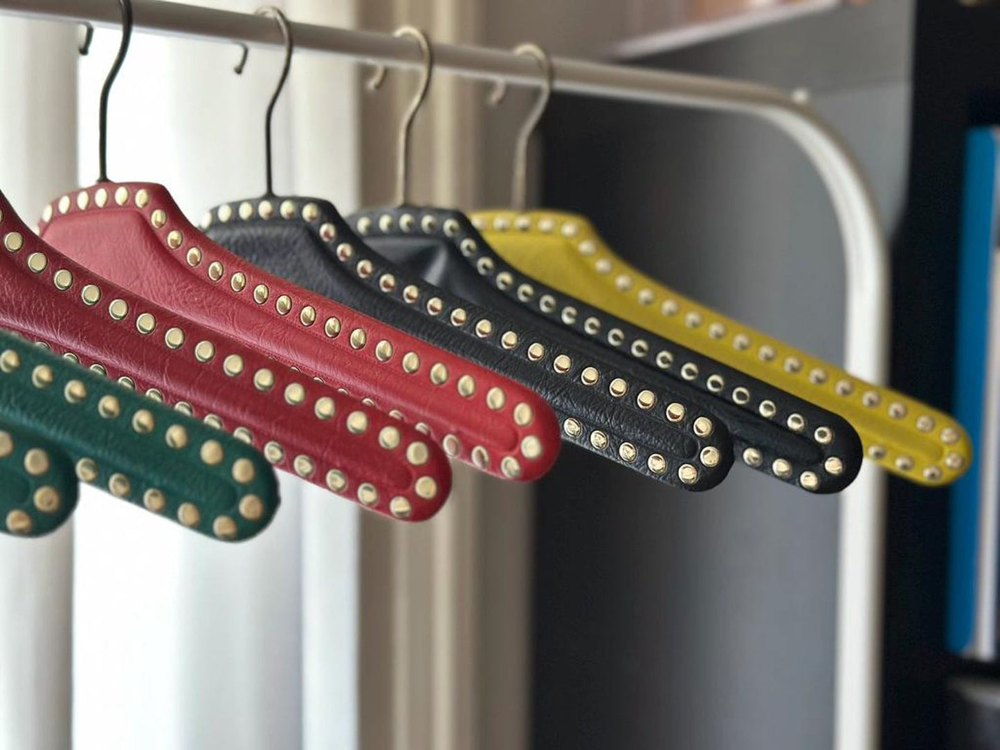 Set of 7 vintage skai hangers with studs. Mid-century. Germany, 1960s