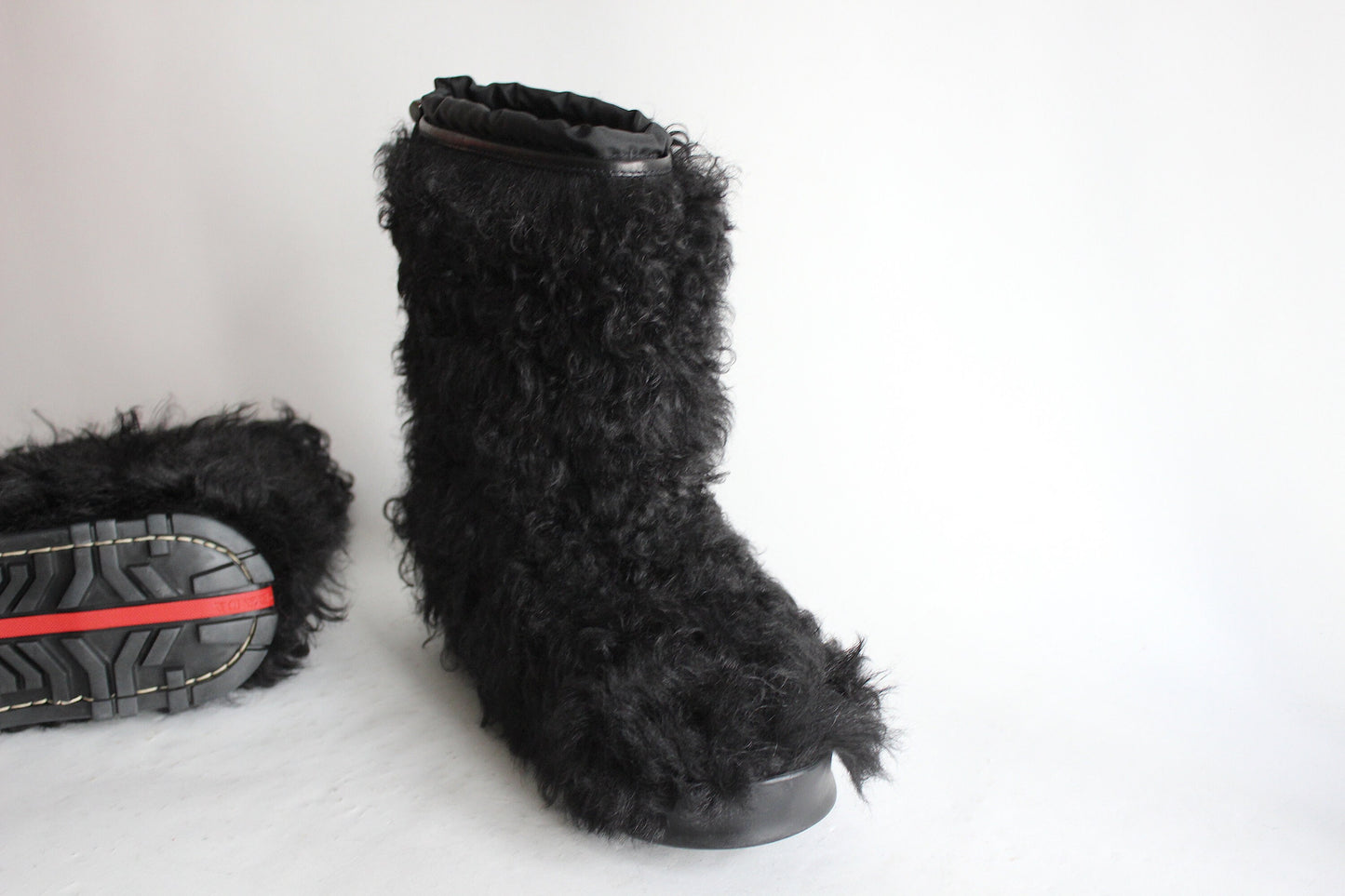 Vintage Glam: Prada Sport Curly Hair Après-Ski Boots from the Early 2000s