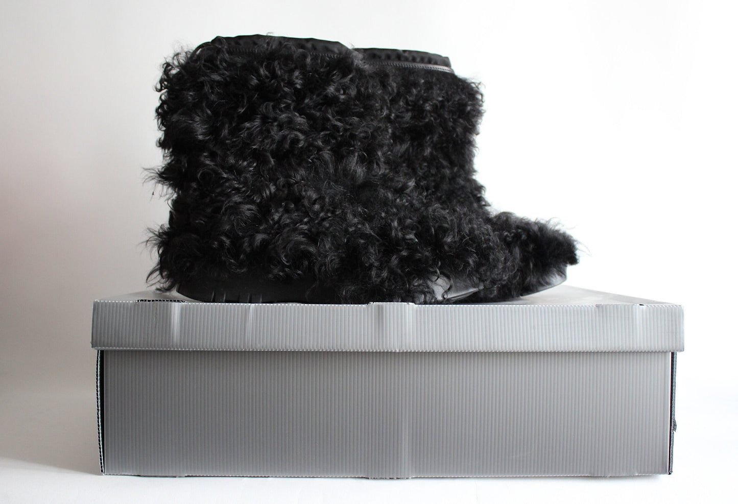 Vintage Glam: Prada Sport Curly Hair Après-Ski Boots from the Early 2000s