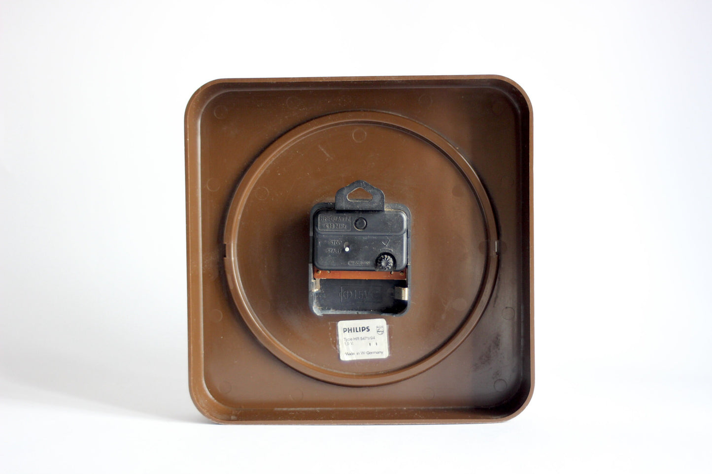Vintage Philips wall HF quartz clock, model HR5471, retro mid-century design from the 1970s, West Germany.