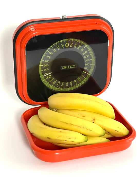 Orange wall mounted kitchen scale by Eks – 1970s