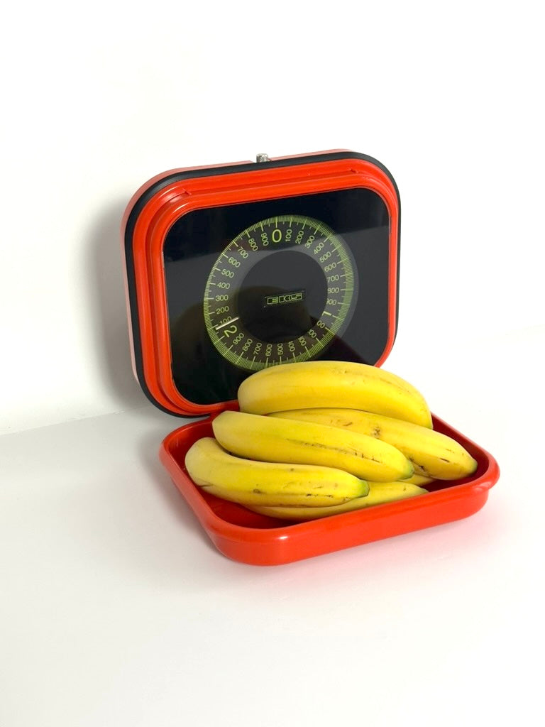 Orange wall mounted kitchen scale by Eks – 1970s
