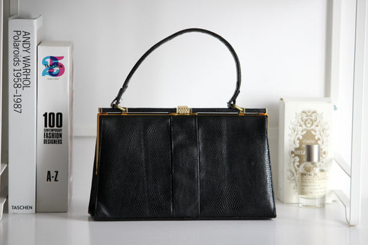 Eleanor – early ’60s black lizard-embossed leather frame bag by Jane Shilton