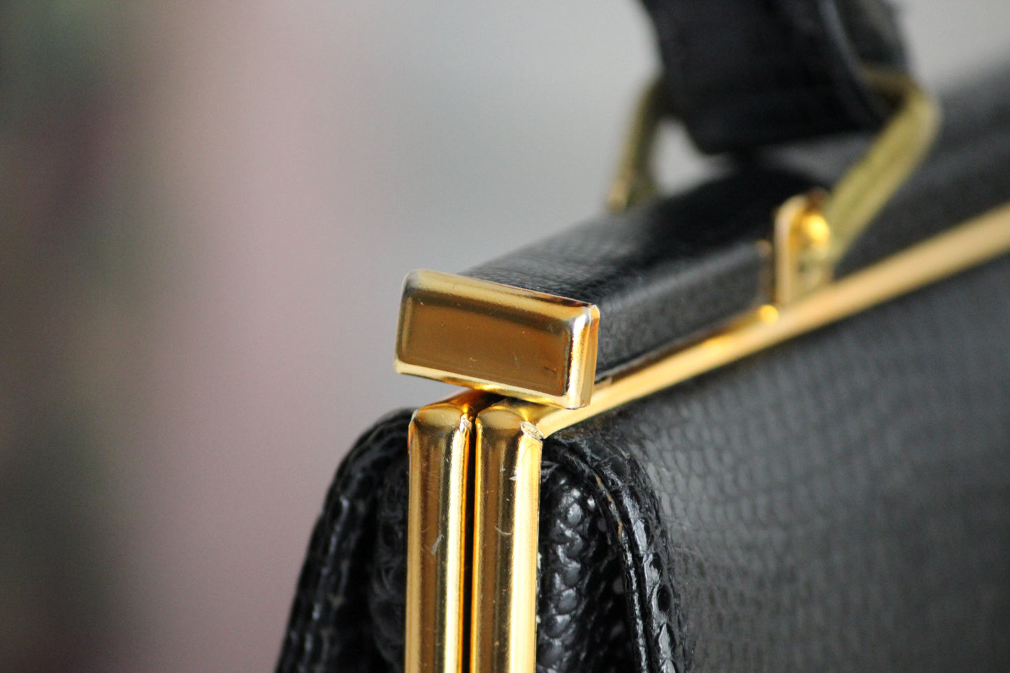 Eleanor – early ’60s black lizard-embossed leather frame bag by Jane Shilton