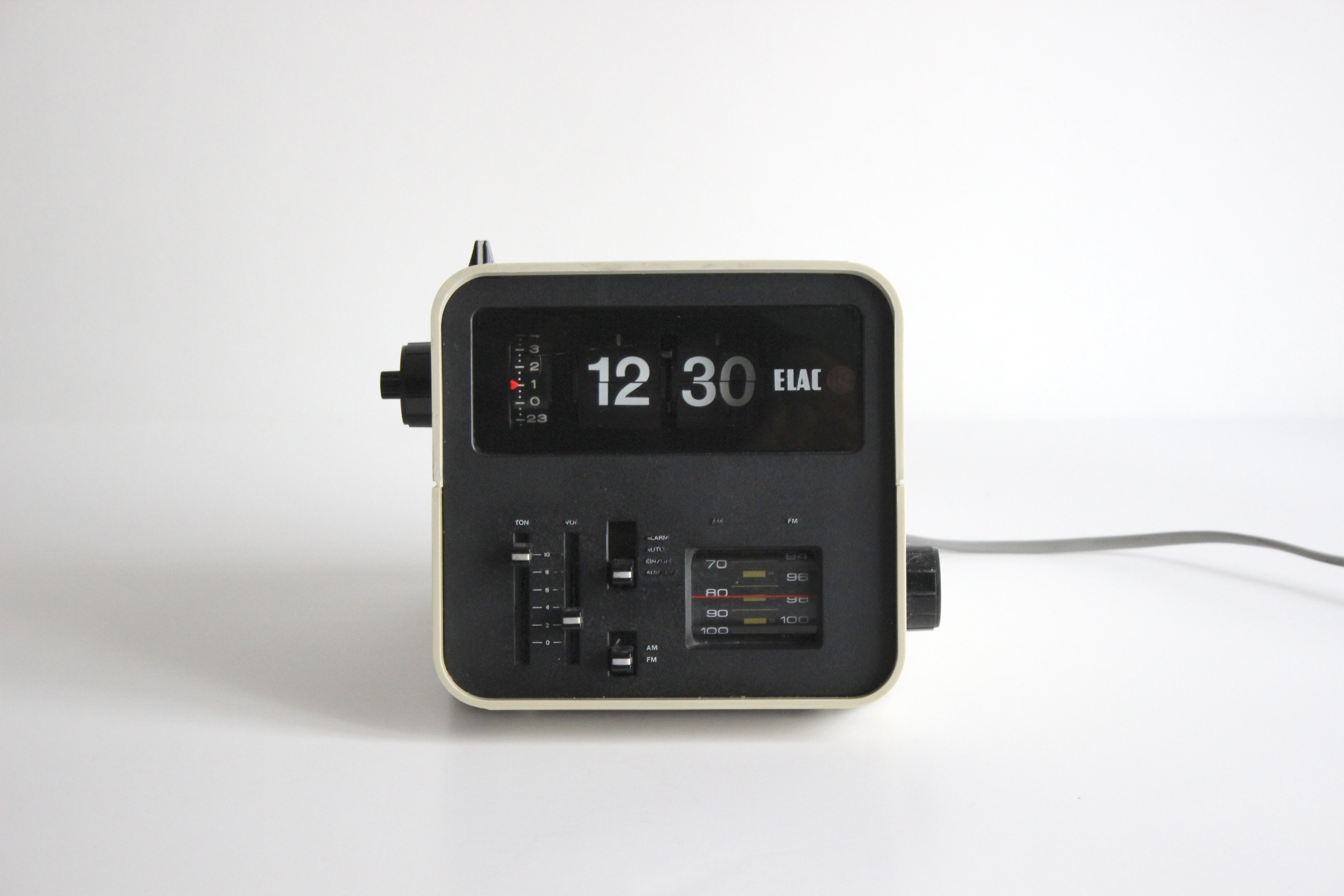 ELAC RD 100, flip alarm clock radio, with folding numbers. White colou ...