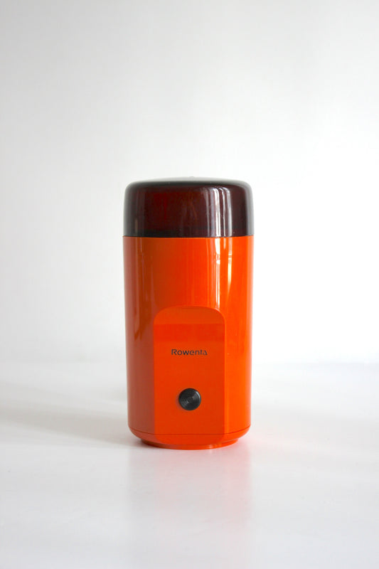 Vintage Rowenta electric coffee grinder · orange + smoked plastic · Germany, 1970s
