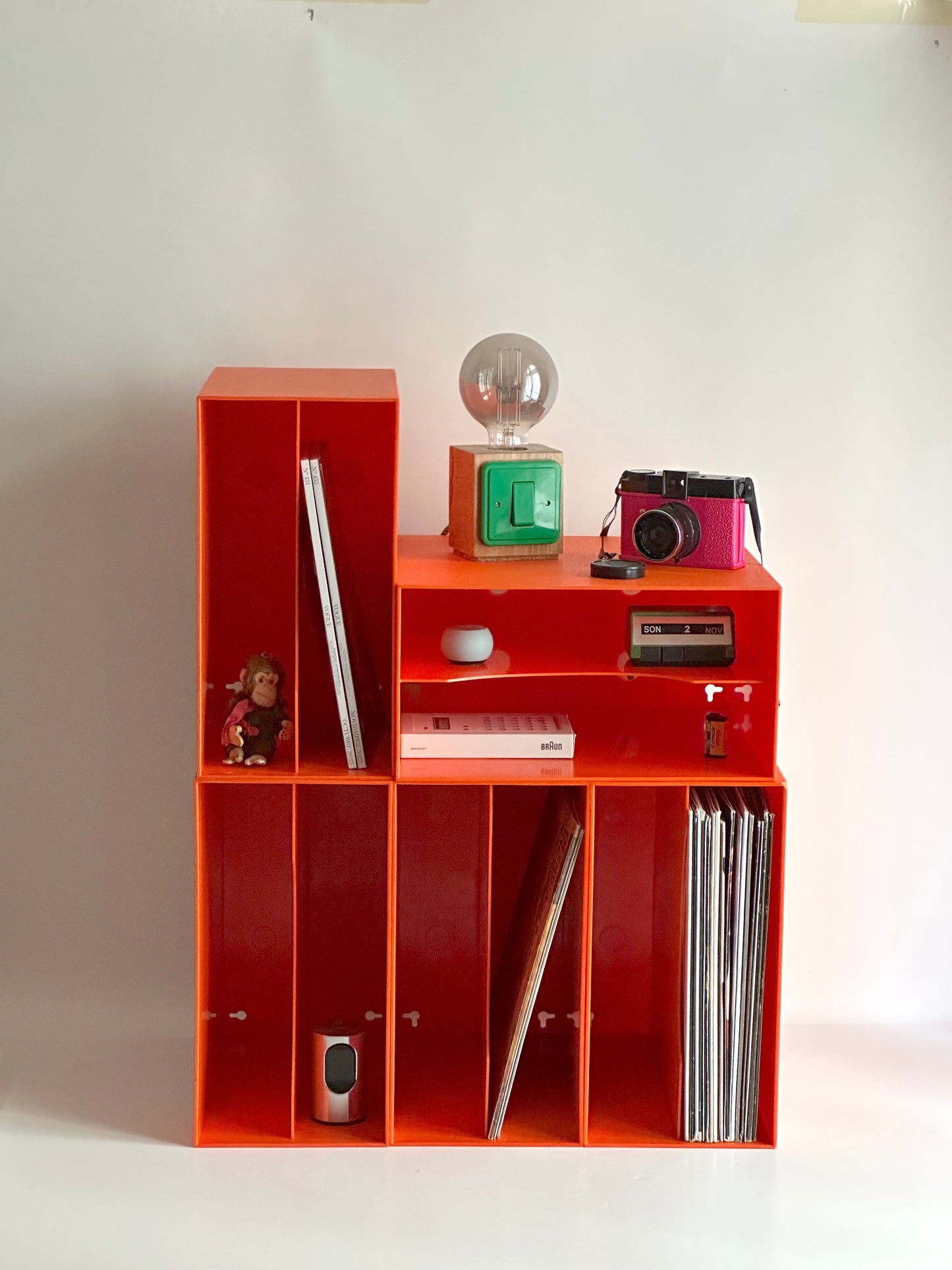 1970s modular orange record storage boxes, German design, unbranded, registered DBGM