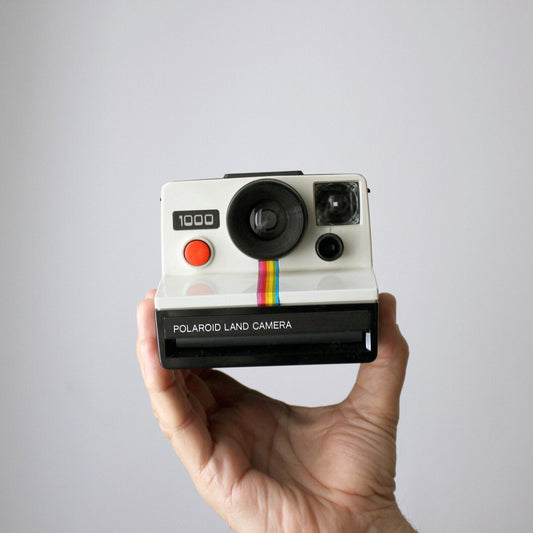 Polaroid 1000 Land Camera - orange shutter button