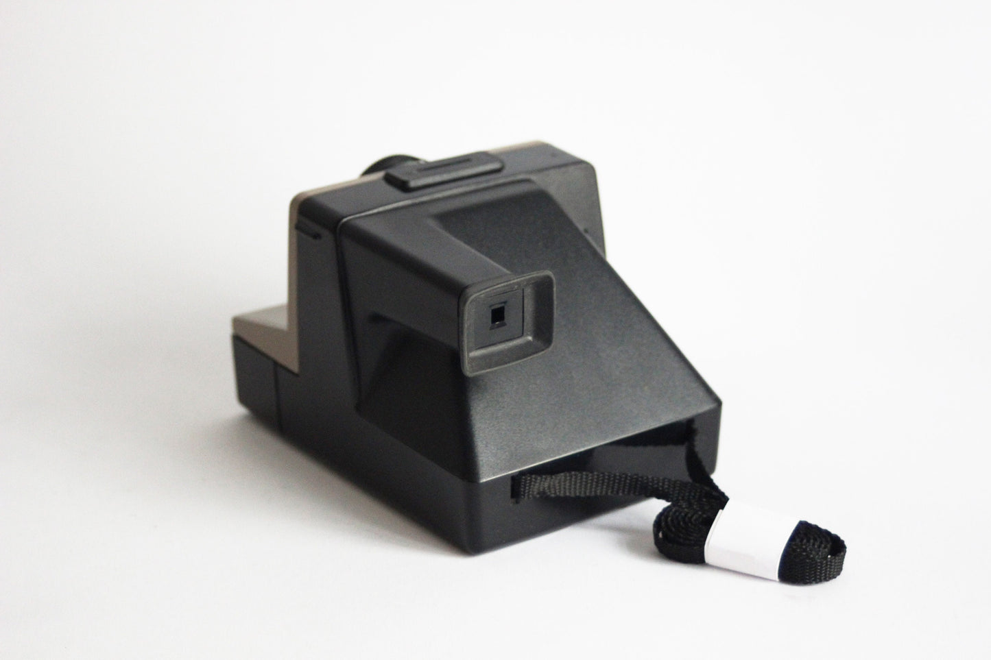 Polaroid 1500 Land Camera - Brown body with green shutter button