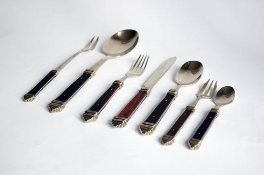 Vintage Scandinavian teak wood brass cutlery set of 48 pieces from the late 60's. Mid-Century teak wood cutlery.