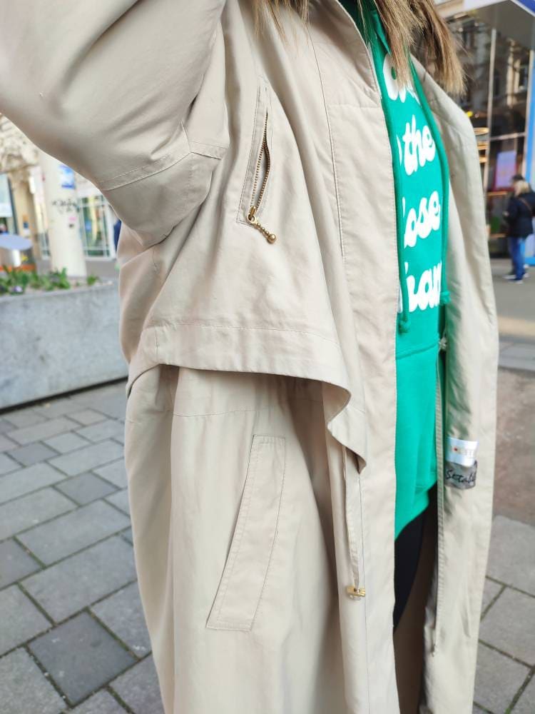 Oversized unisex trench coat, gabardine. 80s, with shoulder pads.