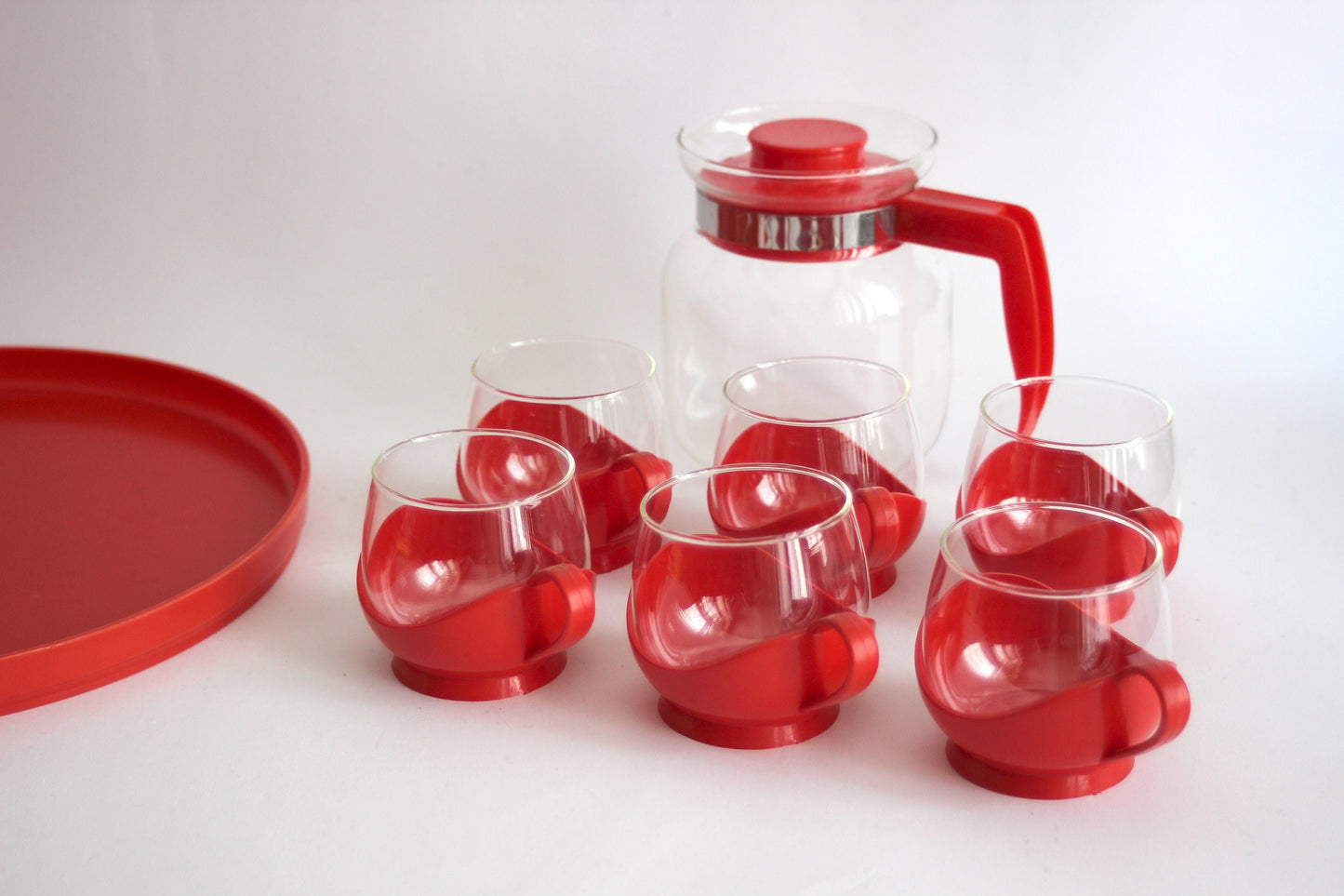MELITTA GERMANY Set of 6 red glass tumblers for tea or coffee and pitcher with plastic handles - 60s / 70s