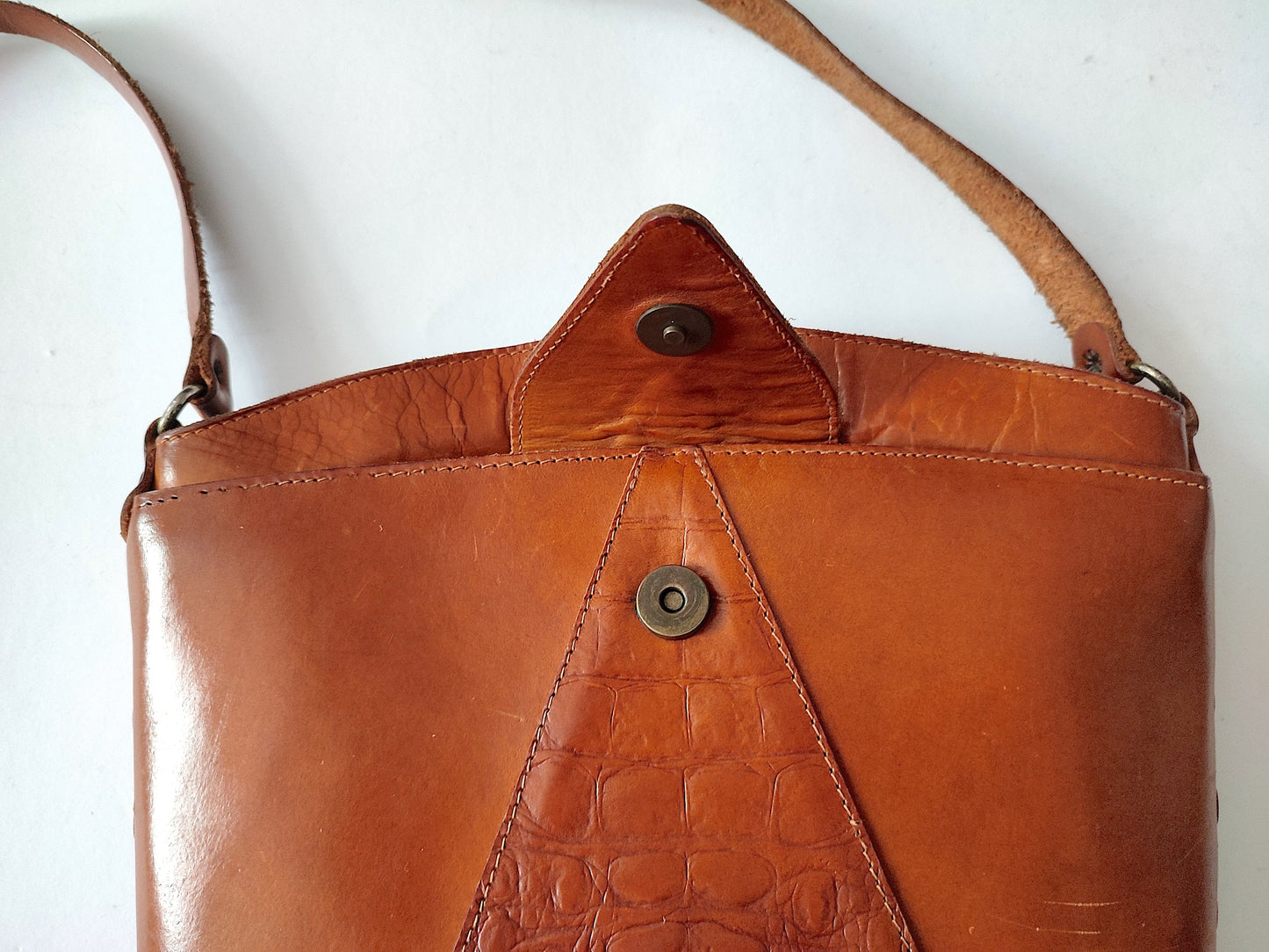 Vintage brown leather bag with a long handle. 90s