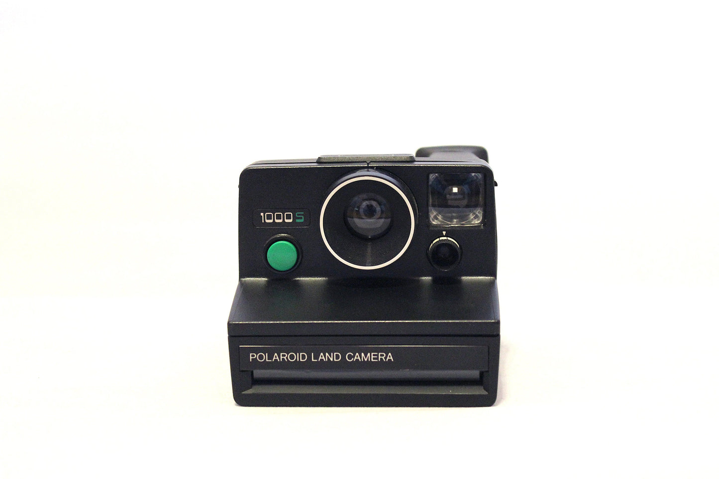 Polaroid 1000S Land Camera - green button [includes original box and original book instruccions]. Form 1977.