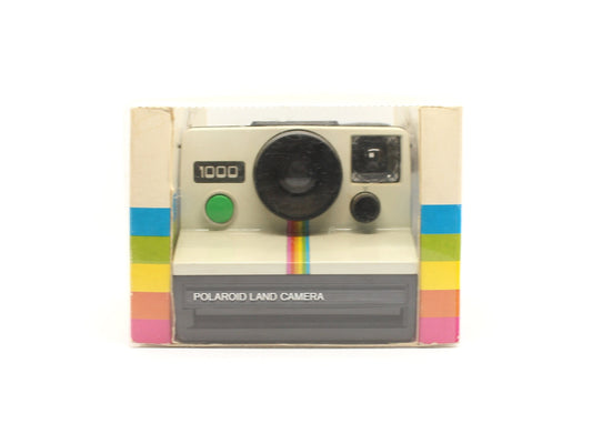 Polaroid 1000 Land Cámera - green button [includes original box and original book instruccions]