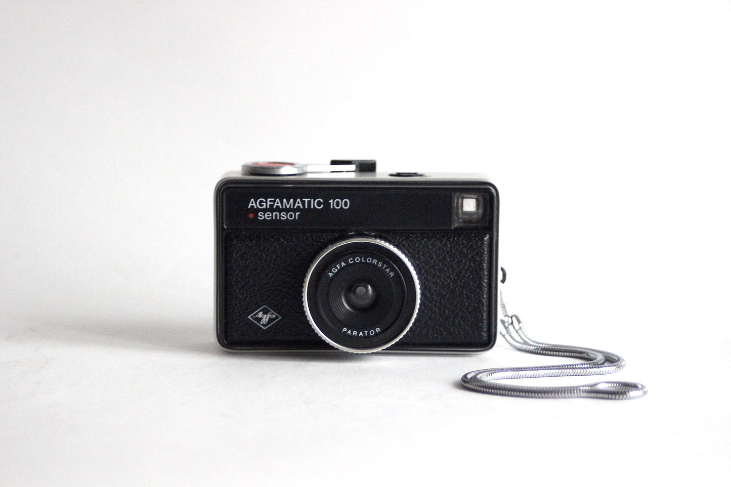 Limited edition AGFA Agfamatic Sensor 100 AIGNER edition with leather case.